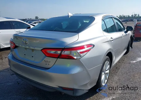 2019 Toyota Camry Le from USA, damaged, VIN 4T1B11HK9KU712631